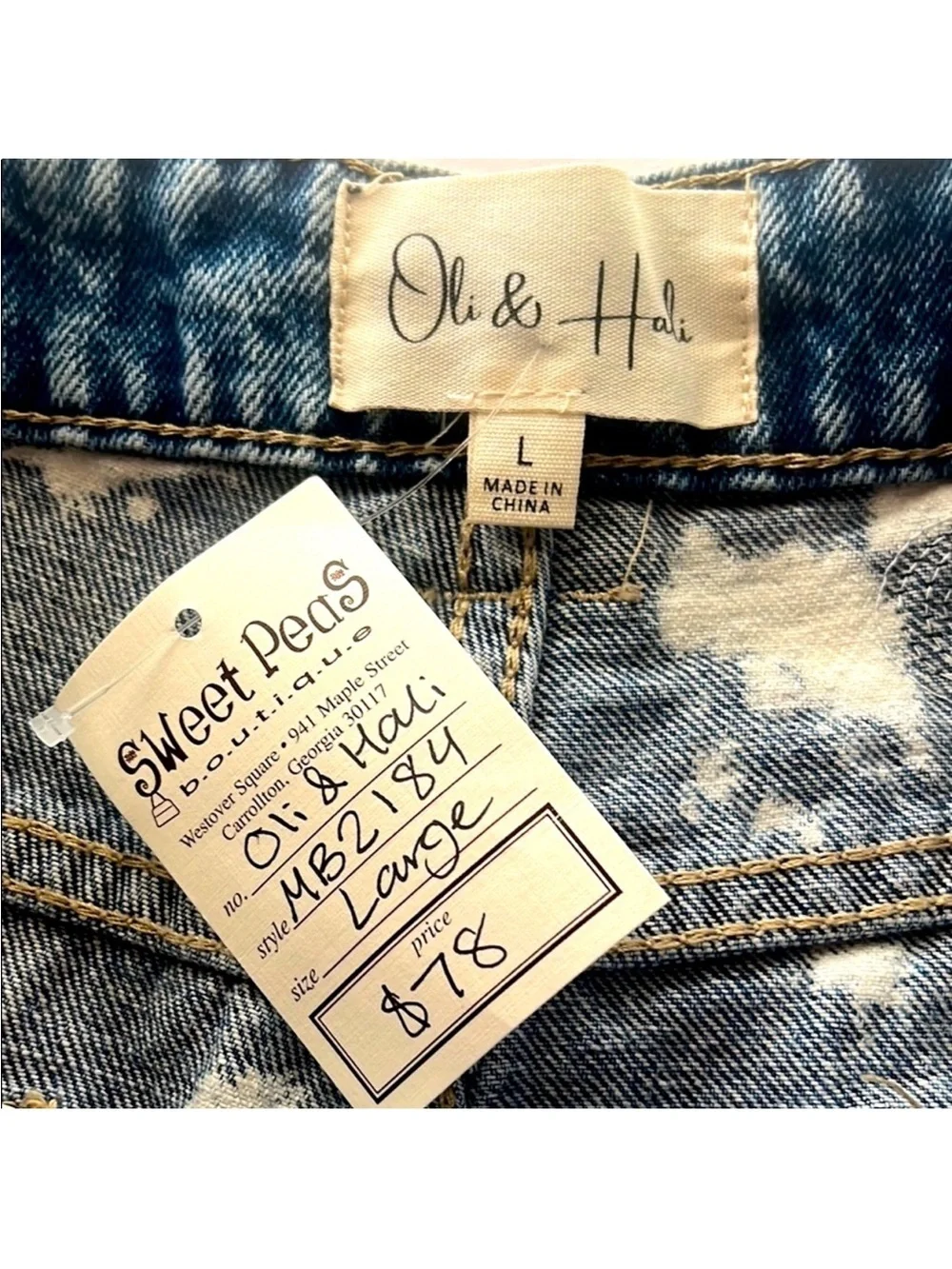 Oli & Hali Blue Jean Shorts with Distressed Hem and Floral Design. Like new.